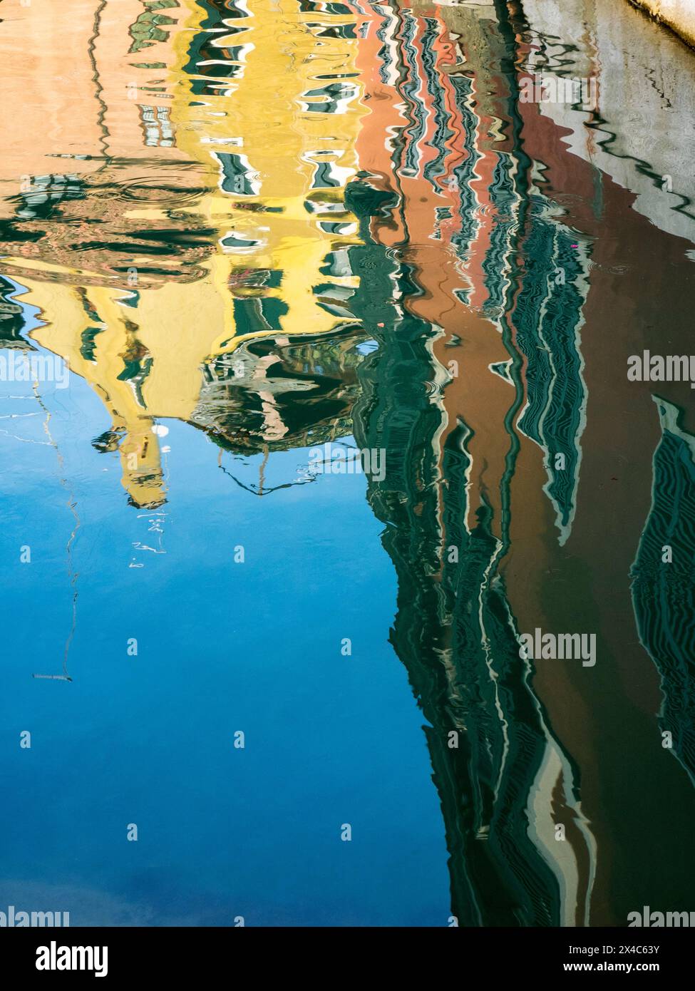 Italy, Venice. Reflection of colorful houses in canal Stock Photo - Alamy