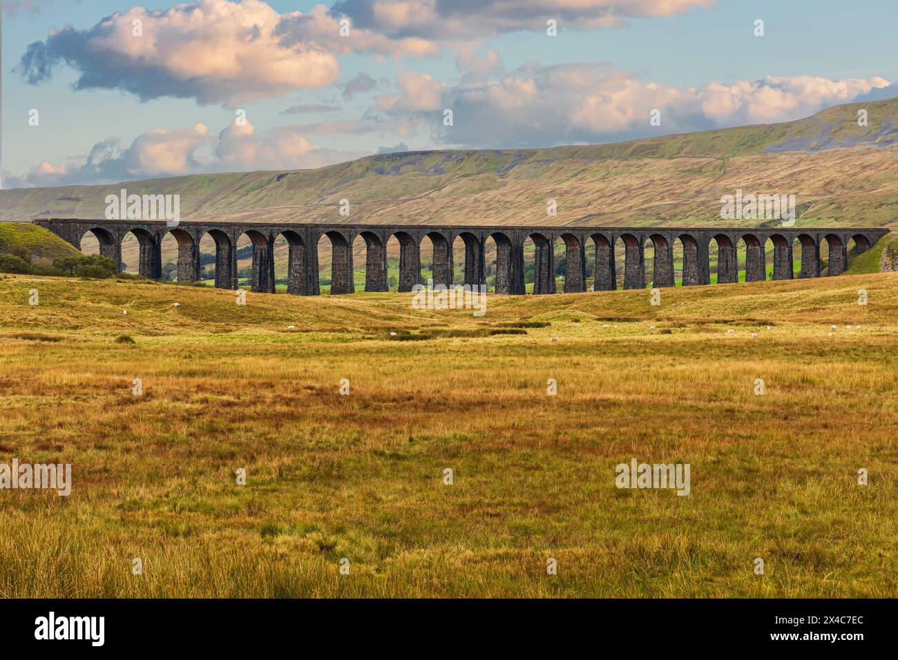 England, North Yorkshire, Ingleton. Ribblehead viaduct. Digital composite sky. Stock Photo
