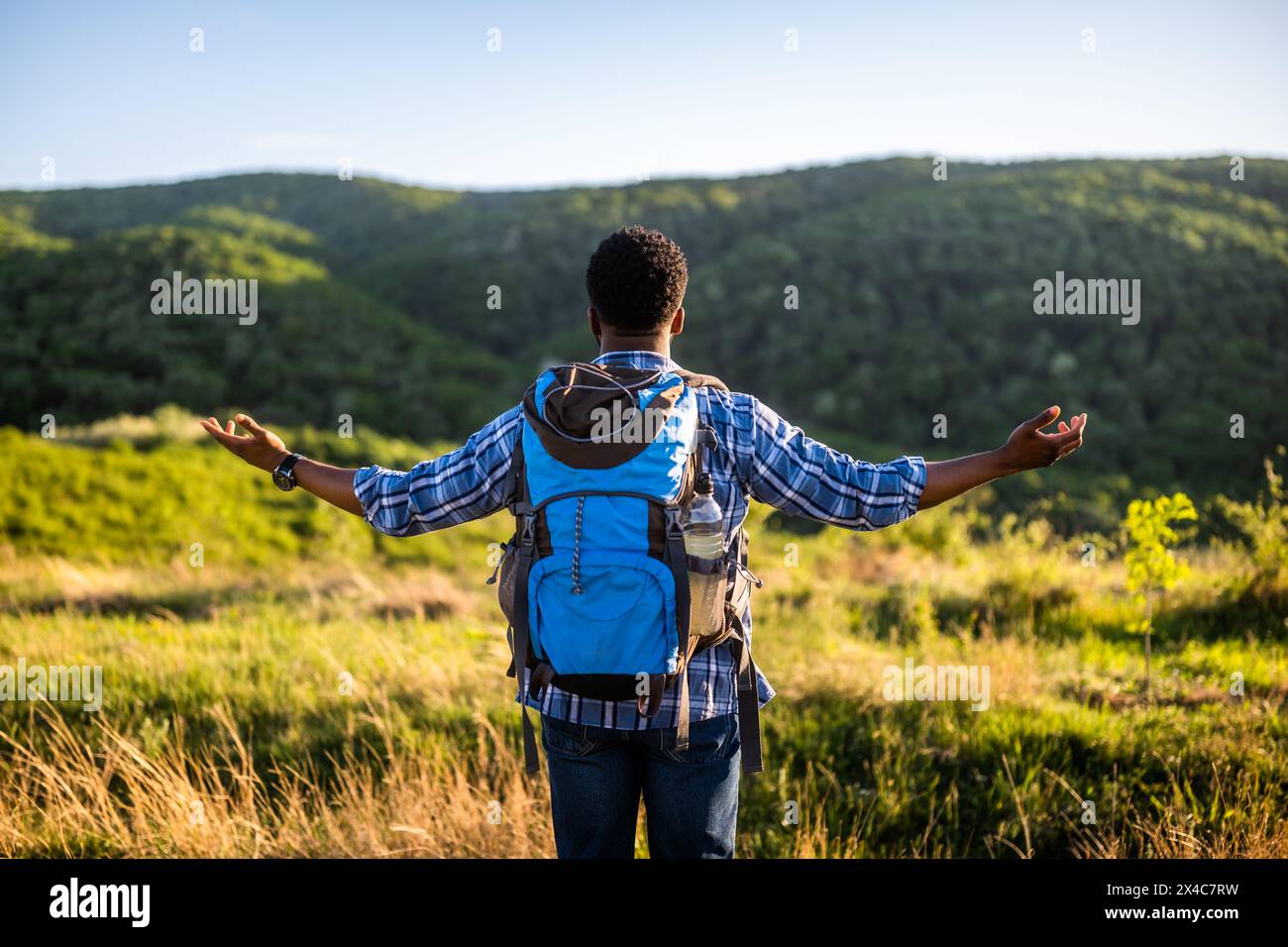 Carefree man tourist hiker hi-res stock photography and images - Alamy