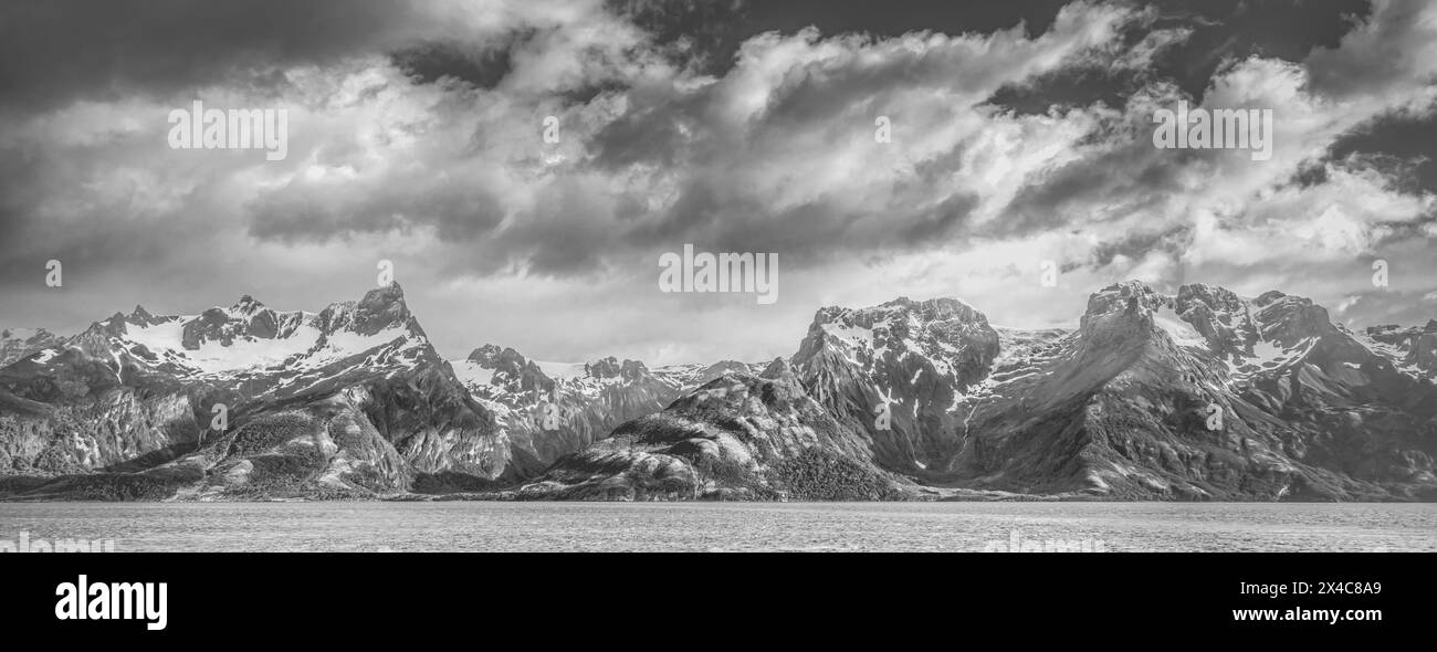 Argentina, Tierra del Fuego National Park. Black and white panoramic of Magellan Strait and mountain range. Stock Photo