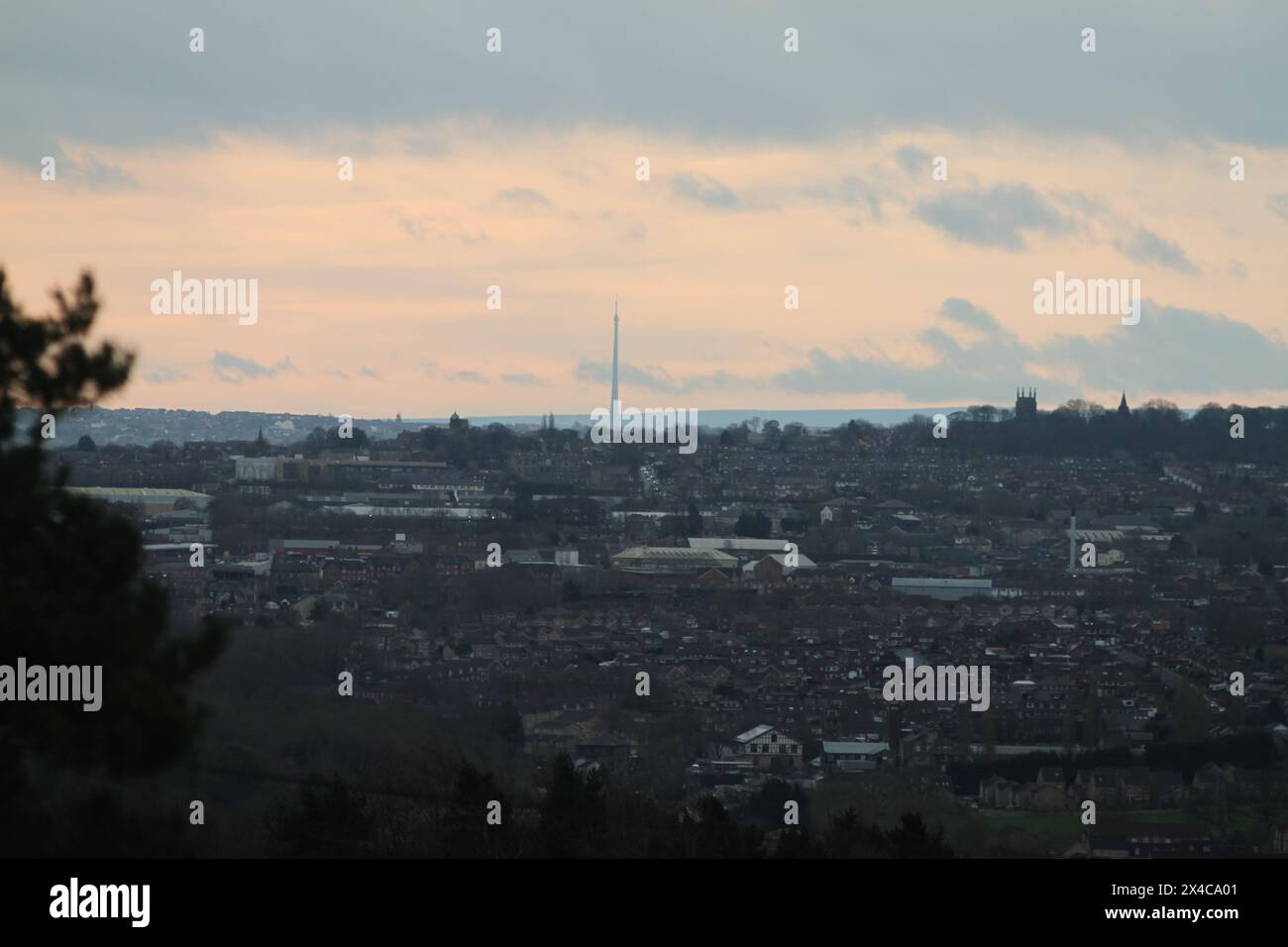 Silhouette of Emley Moor Transmitting Station seen from Leeds Stock Photo