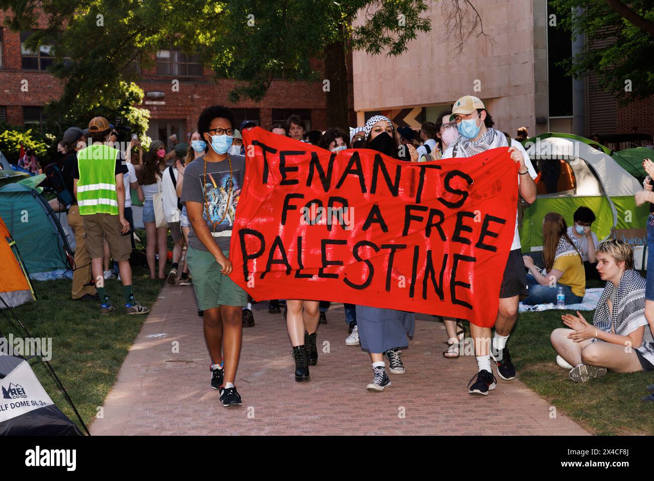 Protesters march inside a pro-Palestinian encampment on the campus of George Washington University in Washington DC on Wednesday, May 1, 2024. House Oversight Republicans visited the encampment ahead of a press conference steps away. Credit: Aaron Schwartz / CNP /MediaPunch Stock Photo