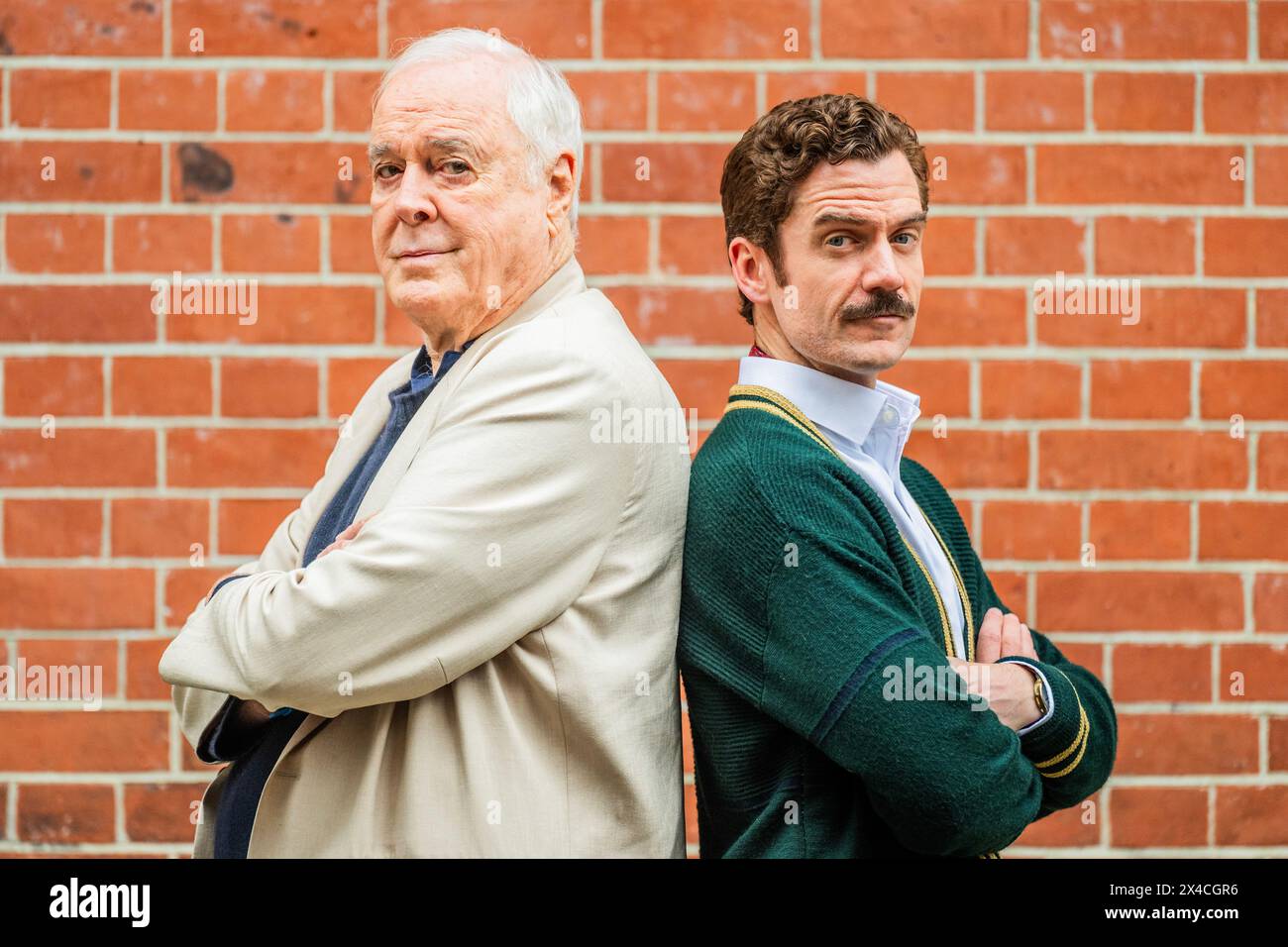 London, UK. 2nd May, 2024. John Cleese with Basil played by Adam JacksonSmith A preview of