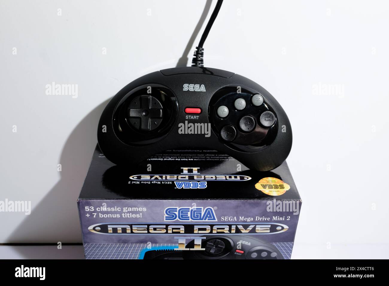 Newcastle UK: 21st Jan 2024: A closeup of a Sega Mega Drive II mini console. Retro gaming. Megadrive controller and box Stock Photo