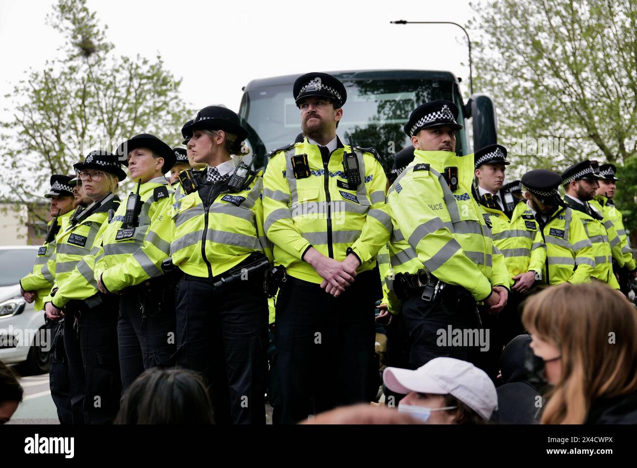 London / UK. 02 May 2024. Protestors block Peckham High street outside Great Western Hotel to prevent the removal of refugees to the Bibby Stockholm barge. Alamy Live News / Aubrey Fagon Stock Photo