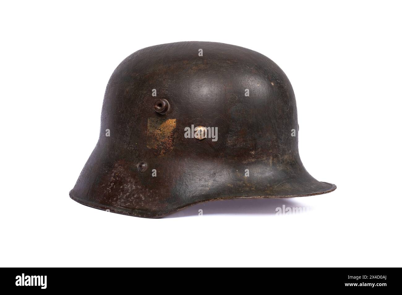 Vintage German Steel Helmet WWII Military Collectible on White Background Stock Photo