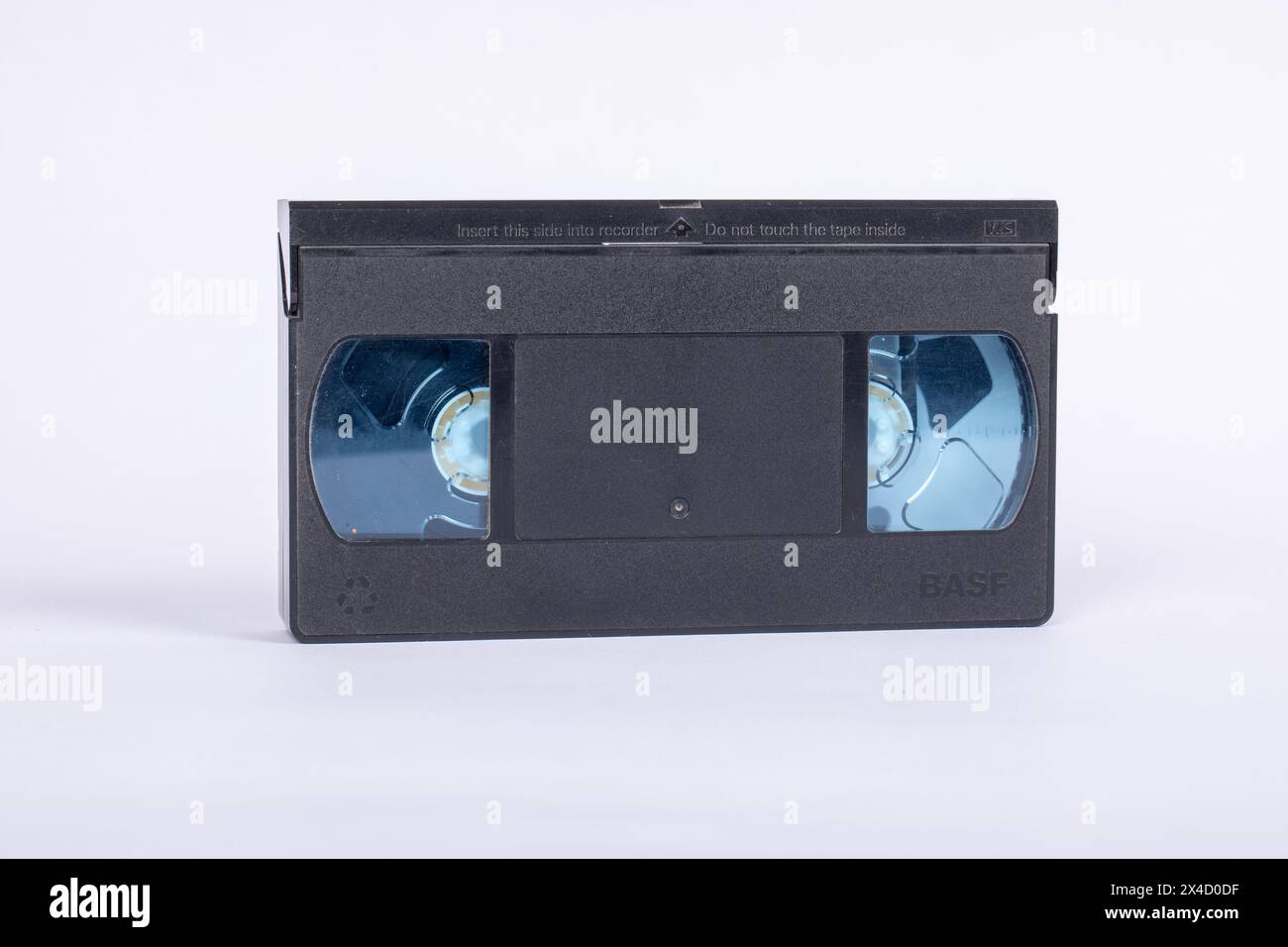 Vintage VHS Tape on White Background - Retro Nostalgia Concept for Media and Entertainment Stock Photo