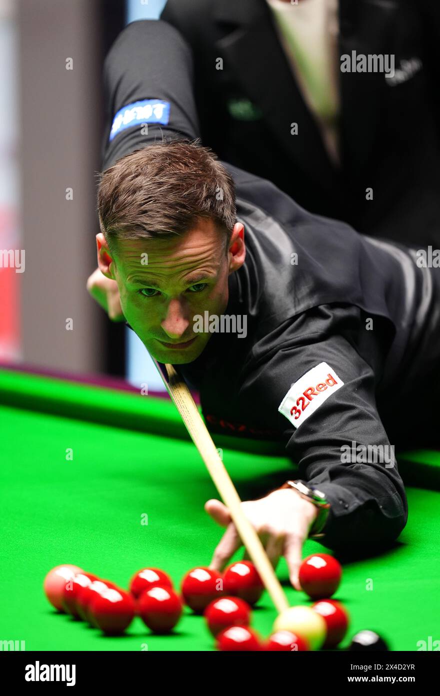 David Gilbert in action against Kyren Wilson (not pictured) during the semi-final match on day thirteen of the 2024 Cazoo World Snooker Championship at the Crucible Theatre, Sheffield. Picture date: Thursday May 2, 2024. Stock Photo