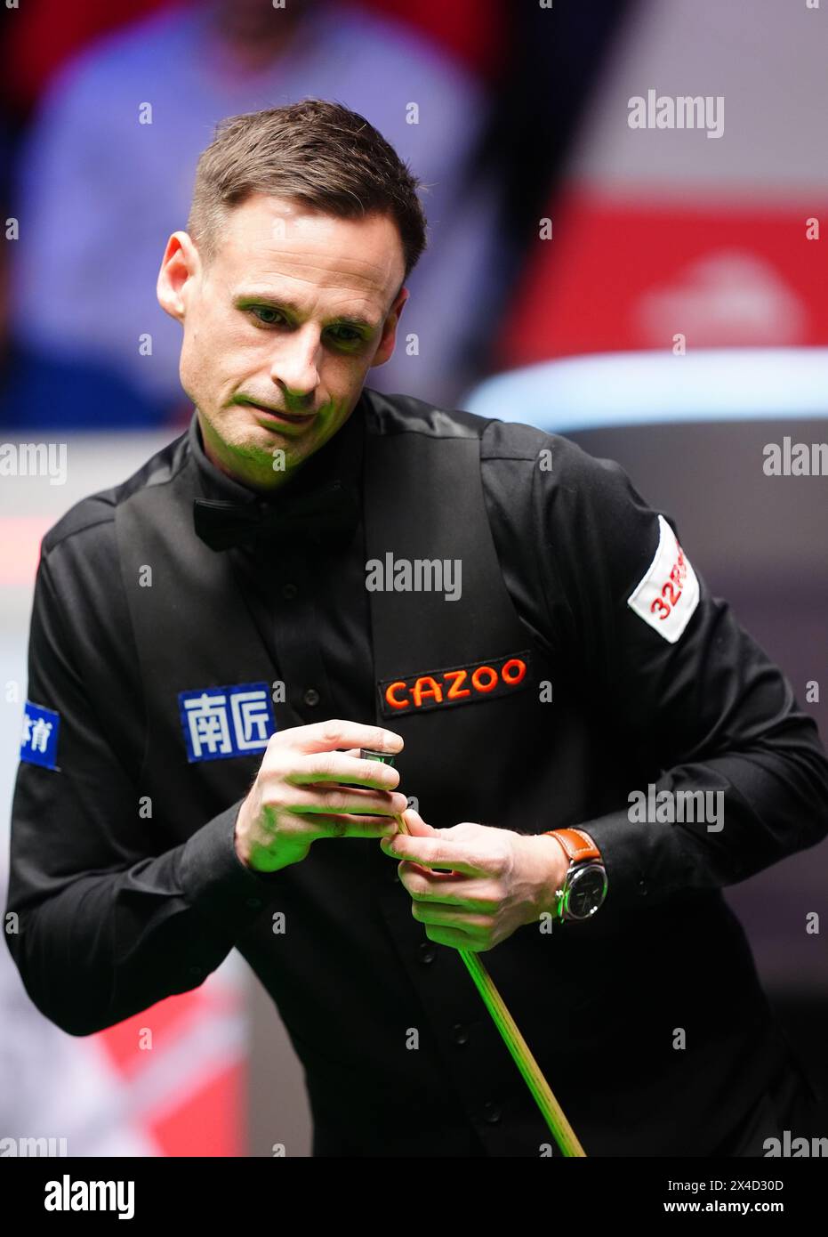 David Gilbert in action against Kyren Wilson (not pictured) during the semi-final match on day thirteen of the 2024 Cazoo World Snooker Championship at the Crucible Theatre, Sheffield. Picture date: Thursday May 2, 2024. Stock Photo