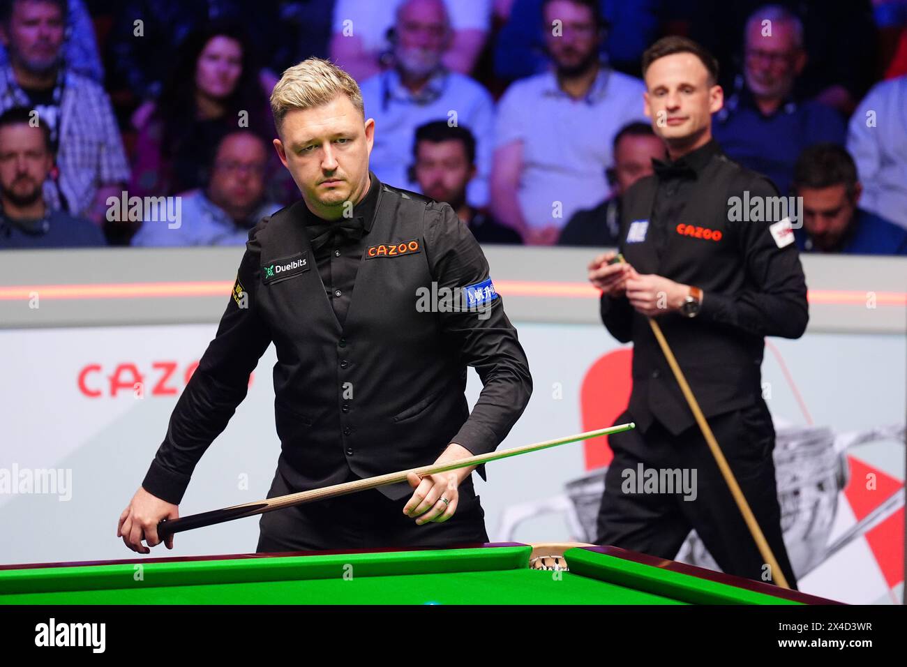 Kyren Wilson (left) in action against David Gilbert during the semi-final match on day thirteen of the 2024 Cazoo World Snooker Championship at the Crucible Theatre, Sheffield. Picture date: Thursday May 2, 2024. Stock Photo