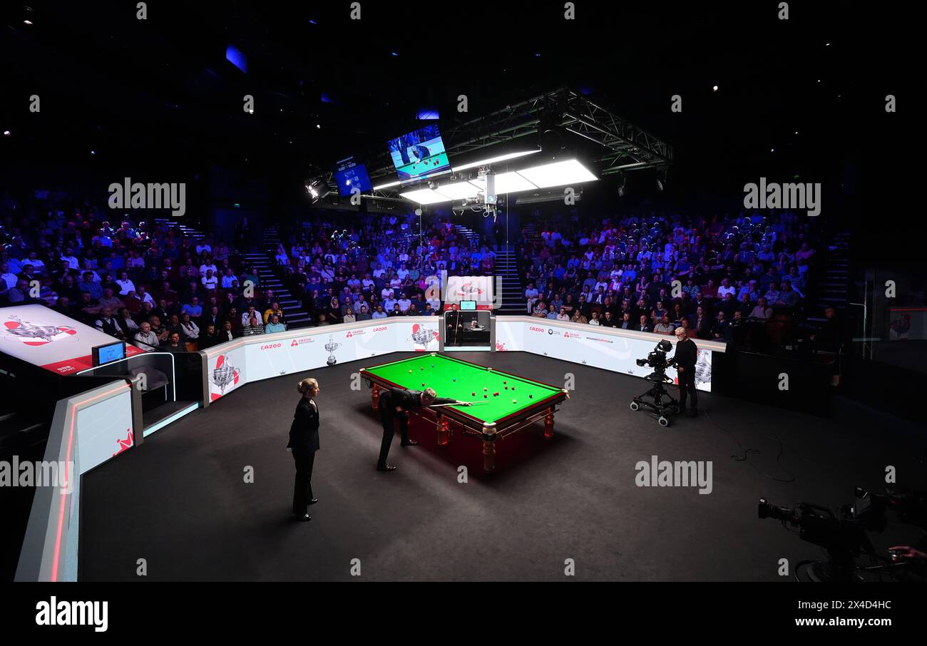 A general view of Kyren Wilson in action against David Gilbert (not pictured) during the semi-final match on day thirteen of the 2024 Cazoo World Snooker Championship at the Crucible Theatre, Sheffield. Picture date: Thursday May 2, 2024. Stock Photo