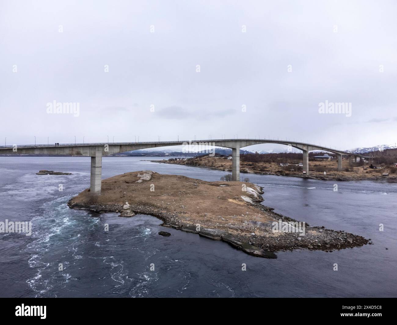 Aerial drone view of world's strongest tidal whirlpools - maelstroms - between Saltfjorden and Skjerstad Fjord t in Saltstraumen, Norway Stock Photo