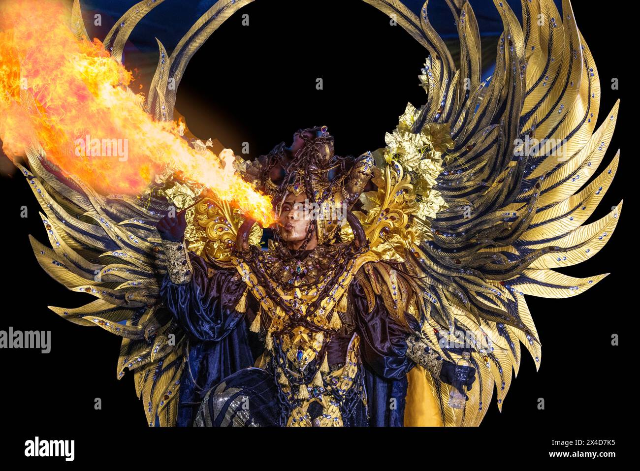 Indonesia, East Java, Jember. Close-up of man blowing fire in Jember ...