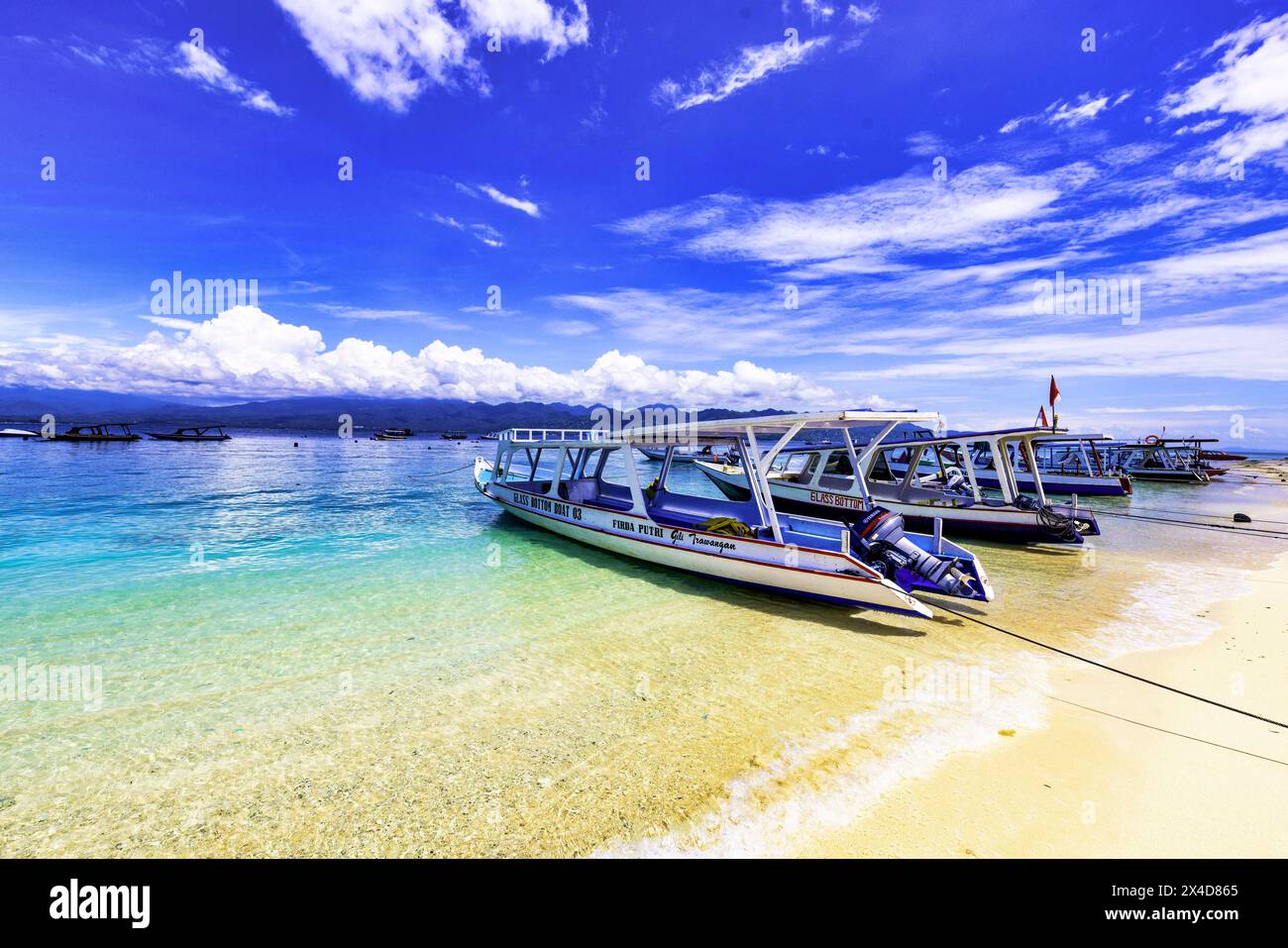 Gili Trawangan Island off the coast of Lombok, Indonesia. White sand, clear warm water with a laid back tropical atmosphere. (Editorial Use Only) Stock Photo