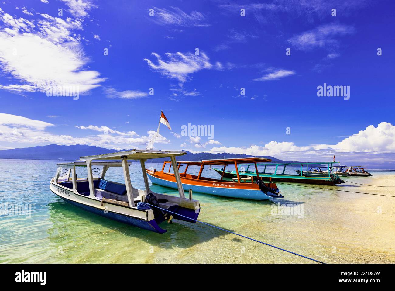 Gili Trawangan Island off the coast of Lombok, Indonesia. White sand, clear warm water with a laid back tropical atmosphere. (Editorial Use Only) Stock Photo