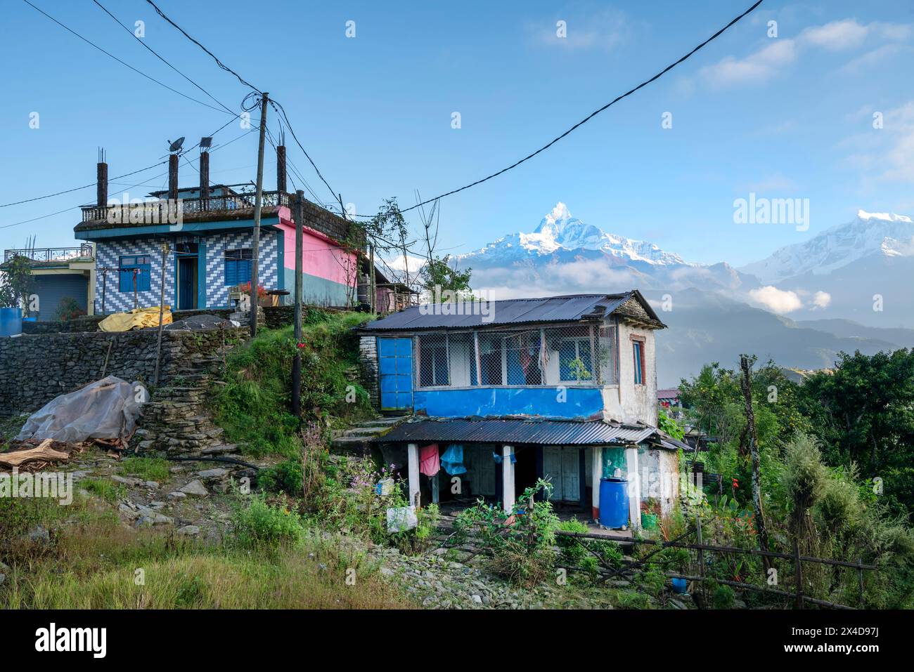 Nepali homes and Machapuchare (Fishtail) Mountain Stock Photo