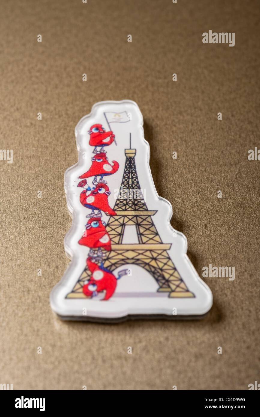 ZHONGSHAN China-April 28 2024: angle view refrigerator magnet with 2024 Paris Olympic Games mascot the Phryge. Stock Photo