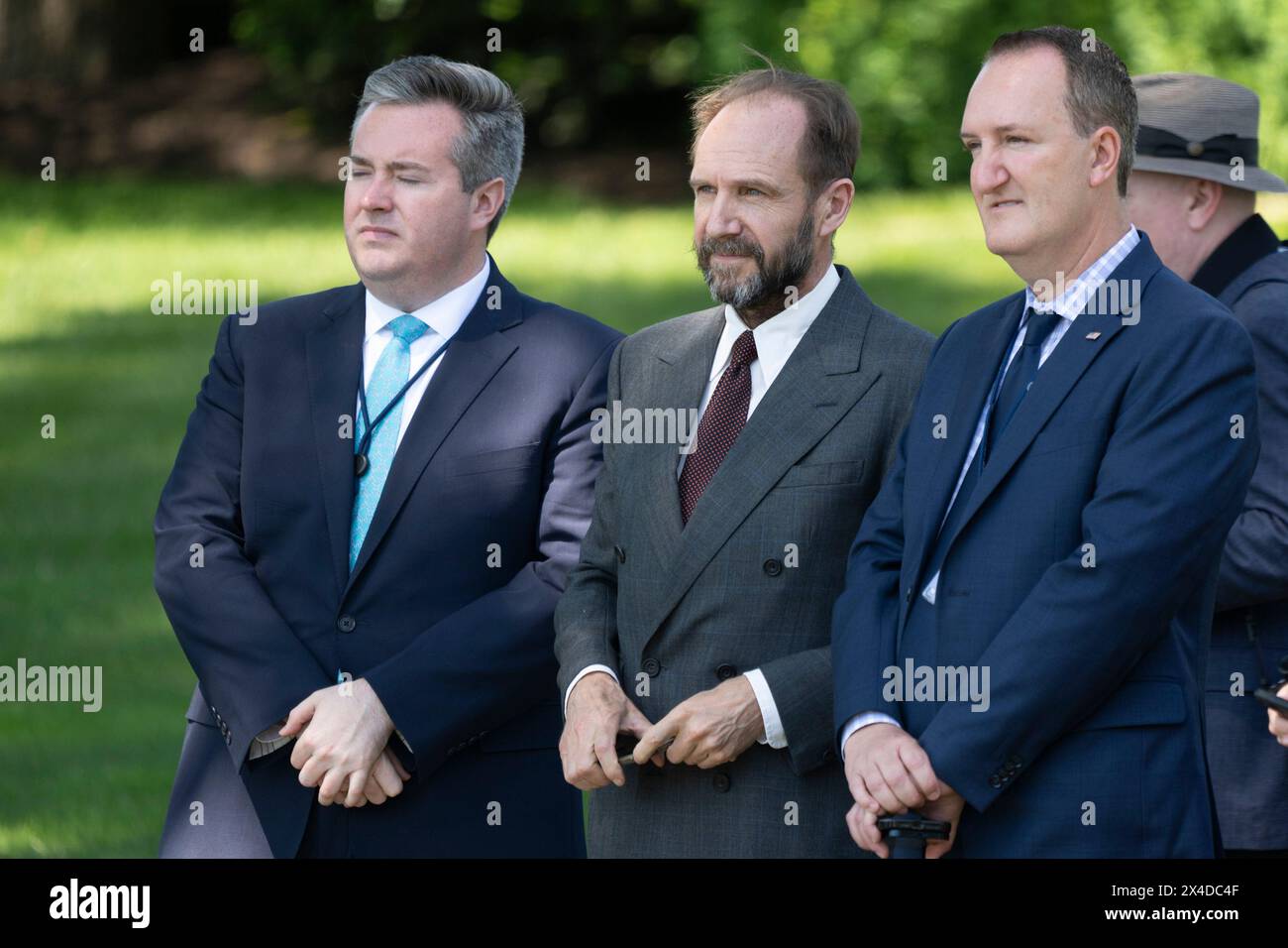 Washington, United States. 01st Apr, 2024. Actor Ralph Fiennes (C) watches as President Joe Biden boards Marine One at the White House in Washington, DC, enroute to North Carolina on Thursday, May 2, 2024. Photo by Chris Kleponis/UPI Credit: UPI/Alamy Live News Stock Photo
