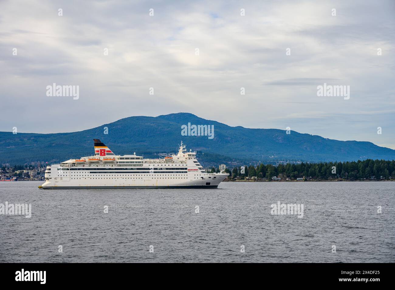 Nanaimo, BC, Canada February 19, 2024: The MV Isabelle, a re-purposed cruise ship retrotitted by Bridgemans Services Group as a Floatel, moored in Nan Stock Photo