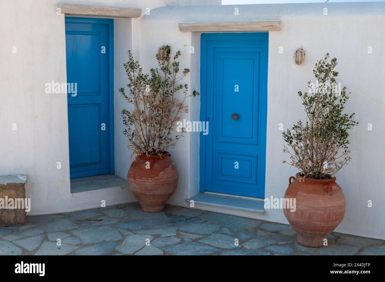 Traditional blue painted doors at the entrance of a windmill. Chora, Mykonos Island, Cyclades Islands, Greece. Stock Photo