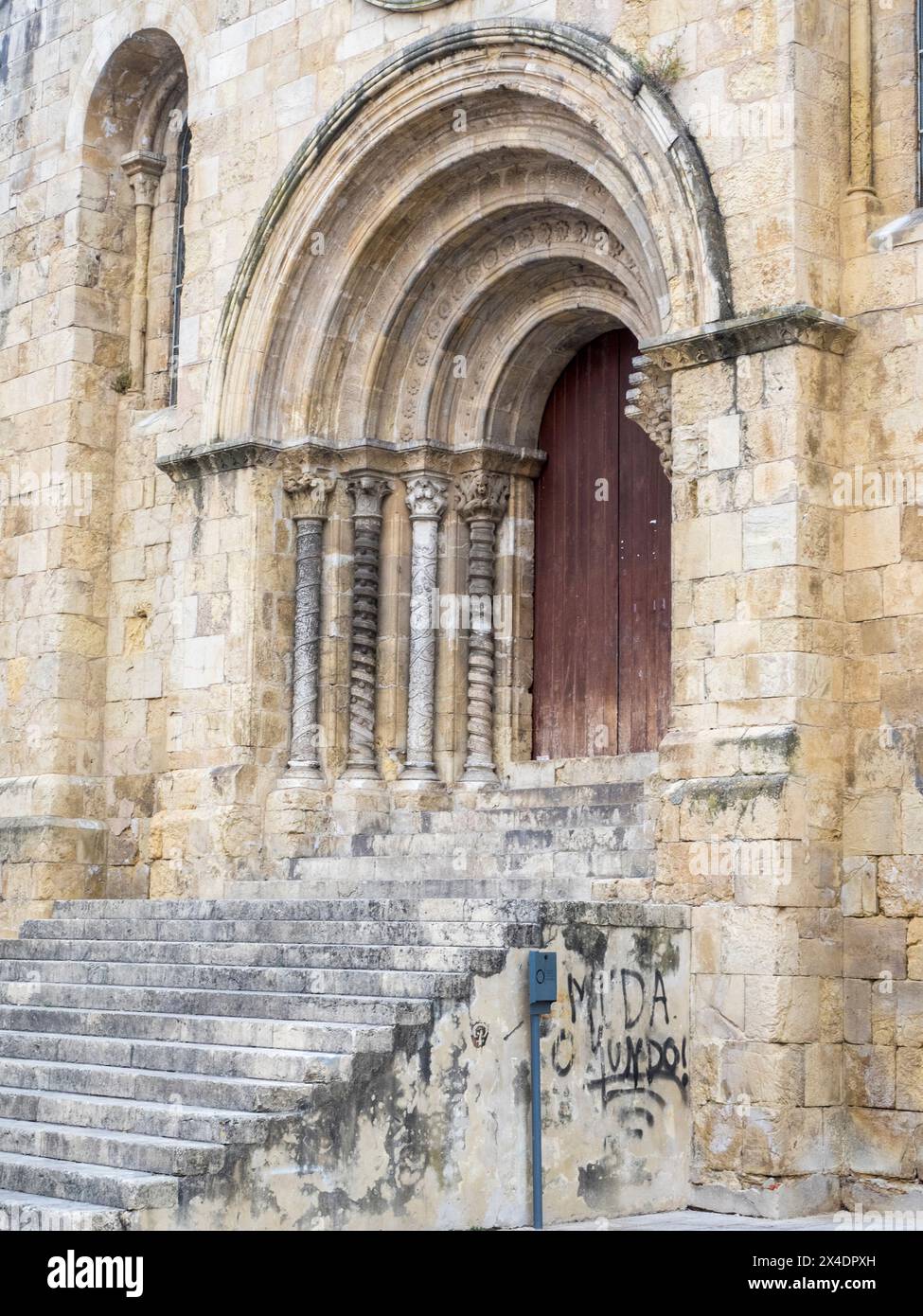 Entrance facade of Se Velha, Santa Maria de Coimbra, the old Cathedral of Coimbra. Stock Photo