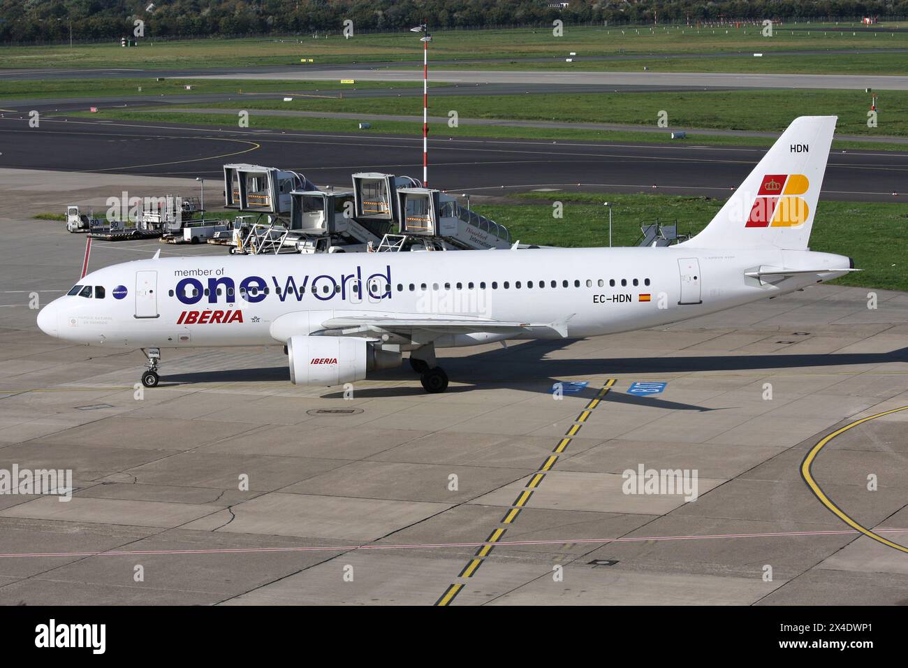 Spanish Iberia Airbus A320-200 with registration EC-HDN in Oneworld Alliance livery at Dusseldorf Airport Stock Photo