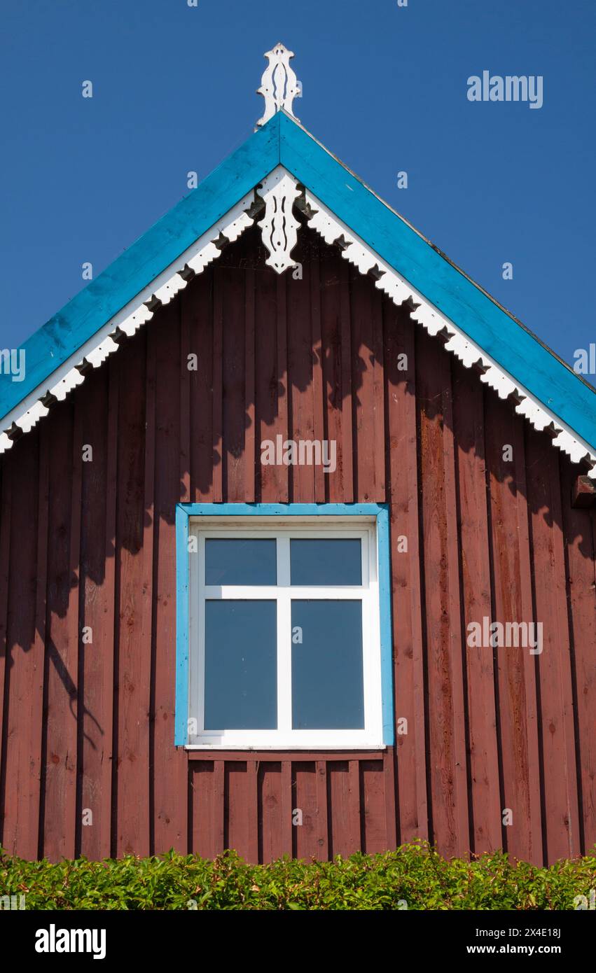 Colourful wooden houses in Nida town on the Curonian Spit in Lithuania in Eastern Europe Stock Photo