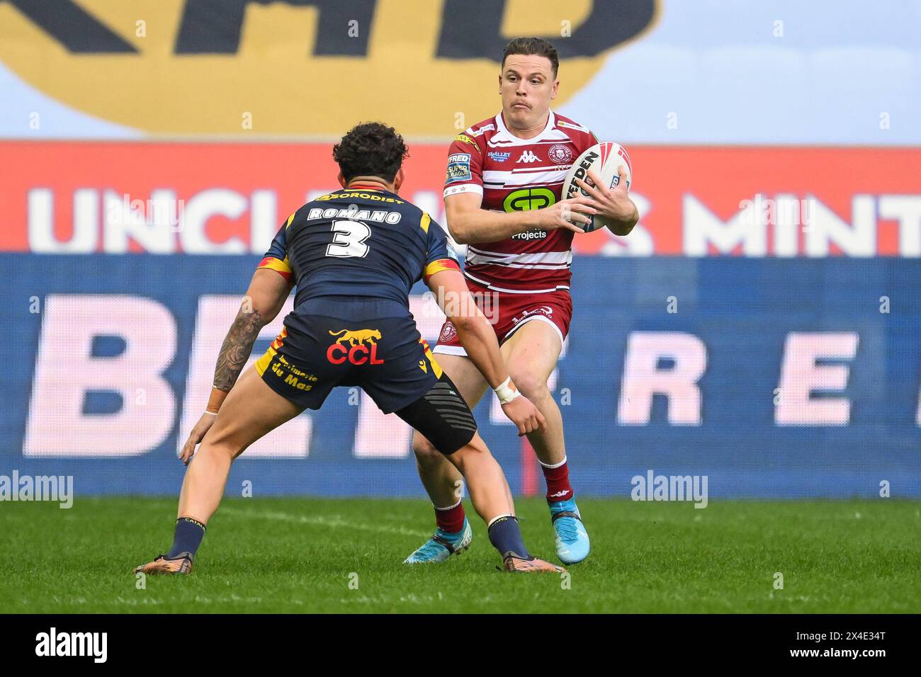 Jai Field of Wigan Warriors makes a break during the Betfred Super League Round 10 match Wigan Warriors vs Catalans Dragons at DW Stadium, Wigan, United Kingdom, 2nd May 2024  (Photo by Craig Thomas/News Images) Stock Photo