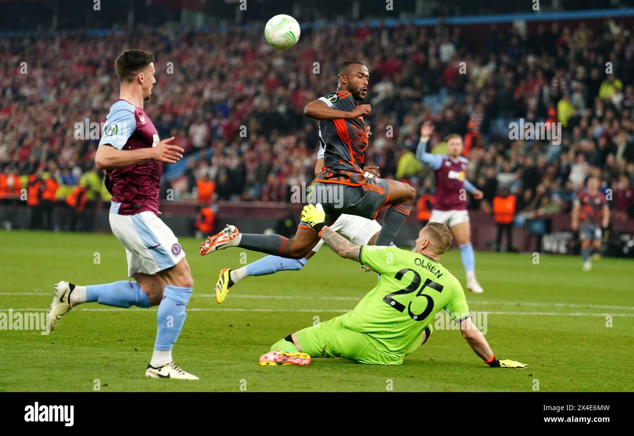 Aston Villa goalkeeper Robin Olsen saves from Olympiacos' Ayoub El Kaabi during the UEFA Conference League semi-final, first leg match at Villa Park, Birmingham. Picture date: Thursday May 2, 2024. Stock Photo