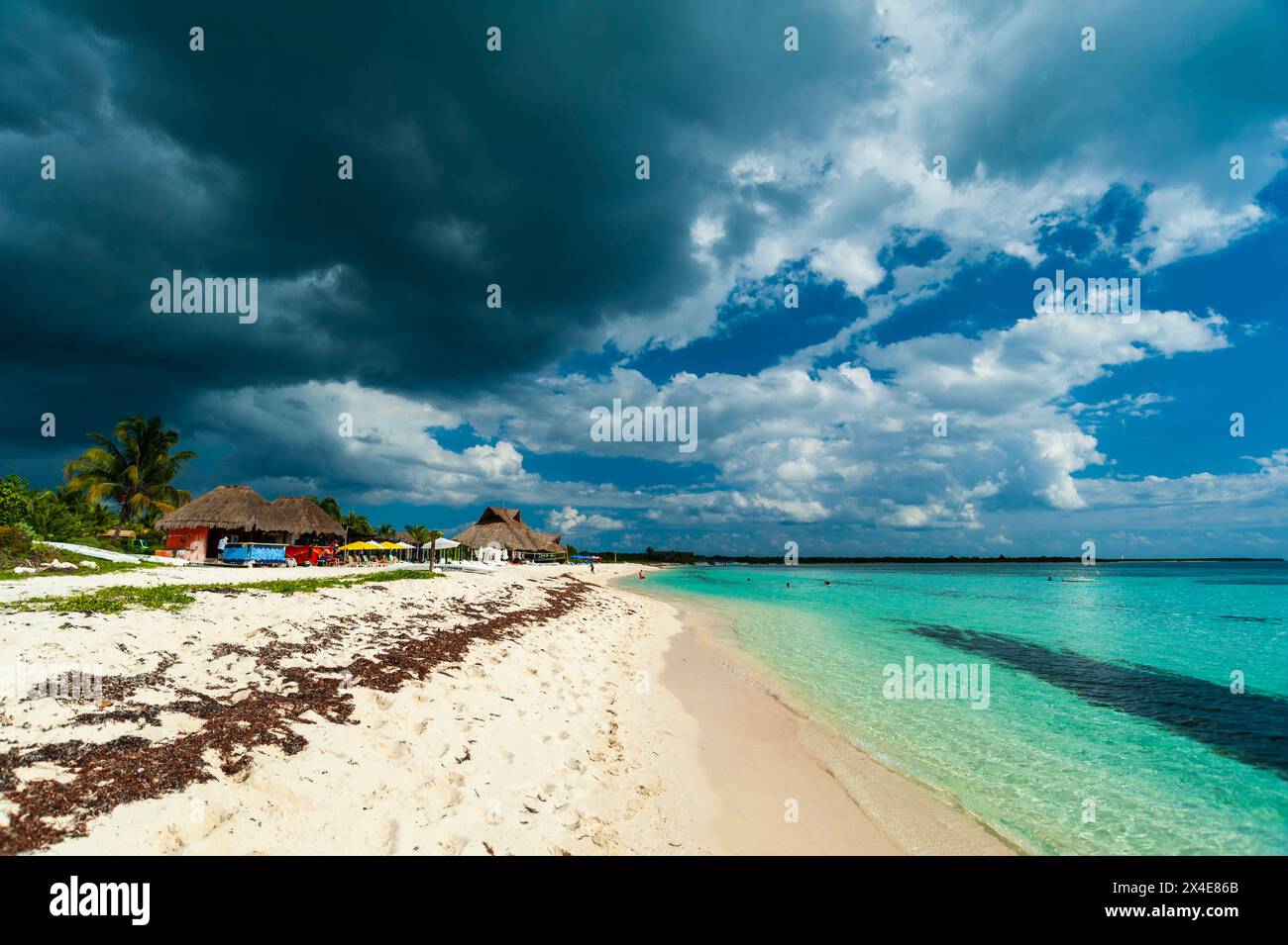 A sandy beach under stormy skies at Punta Sur Eco Park, Cozumel Island, Quintana Roo, Mexico. Stock Photo