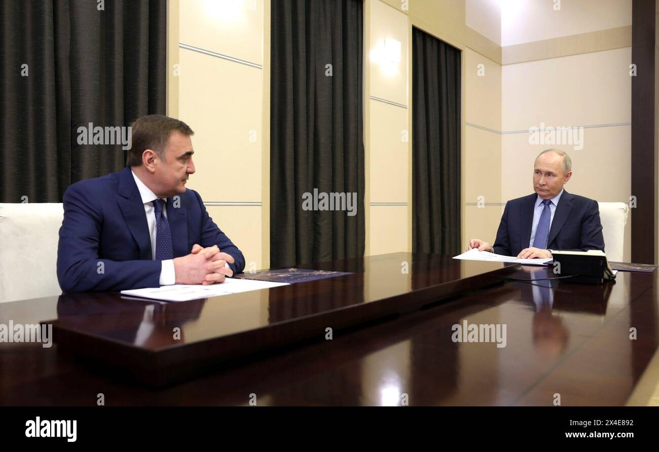 Novo-Ogaryovo, Russia. 02nd May, 2024. Russian President Vladimir Putin, right, listens to Tula Region Governor Alexei Dyumin, left, during a face-to-face meeting at the Novo-Ogaryovo state residence, May 2, 2024 in Moscow Oblast, Russia. Credit: Gavriil Grigorov/Kremlin Pool/Alamy Live News Stock Photo