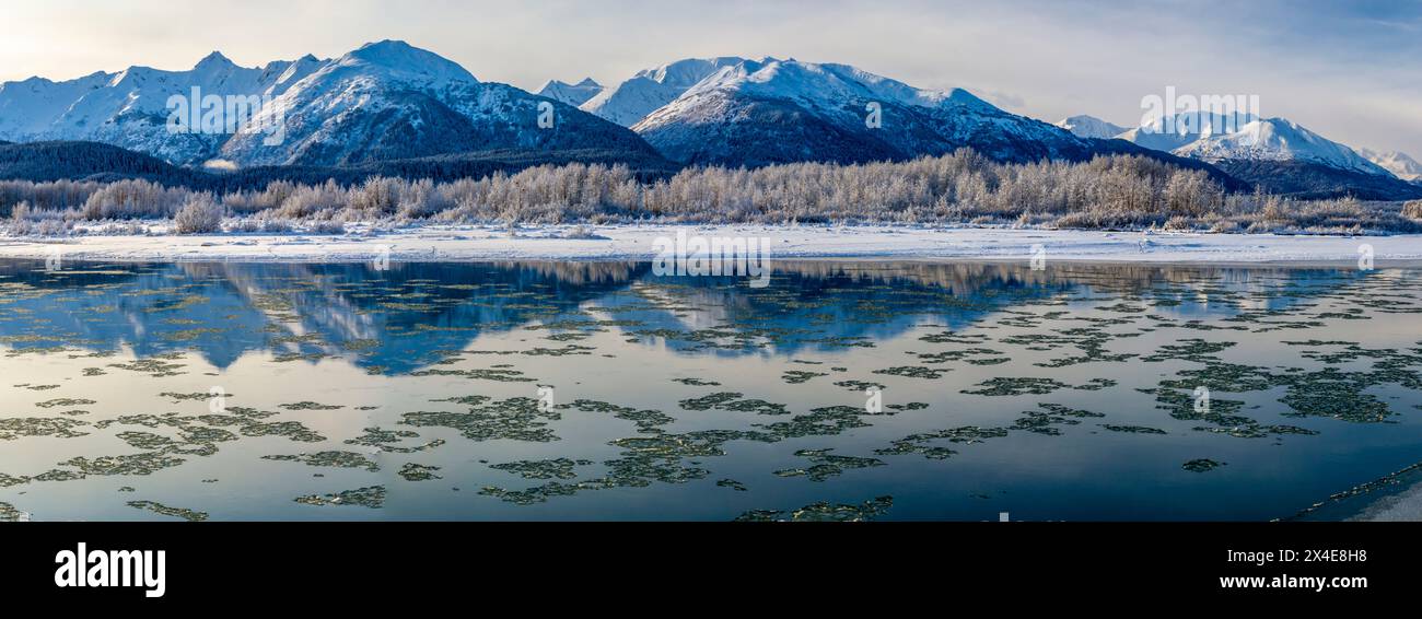 USA, Alaska, Chilkat Bald Eagle Preserve. Panoramic of mountains reflecting in river. Stock Photo