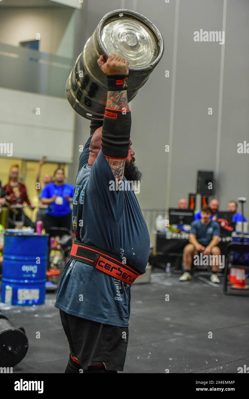 Strongman Matthew Chessum is seen in action with a keg at 2024 Oceania ...
