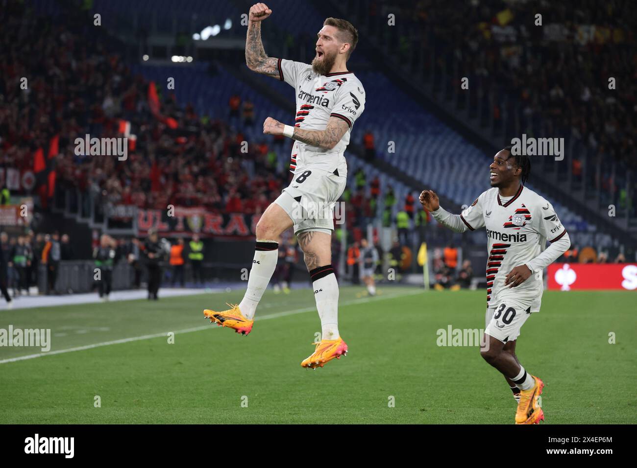 Rome, Lazio, Italy. 2nd May, 2024. ROBERT ANDRICH, Leverkusen, celebrates a goal during the semi-final of the Europa League between Roma vs Bayer Leverkusen at Olympic Stadium. (Credit Image: © Fabio Sasso/ZUMA Press Wire) EDITORIAL USAGE ONLY! Not for Commercial USAGE! Stock Photo