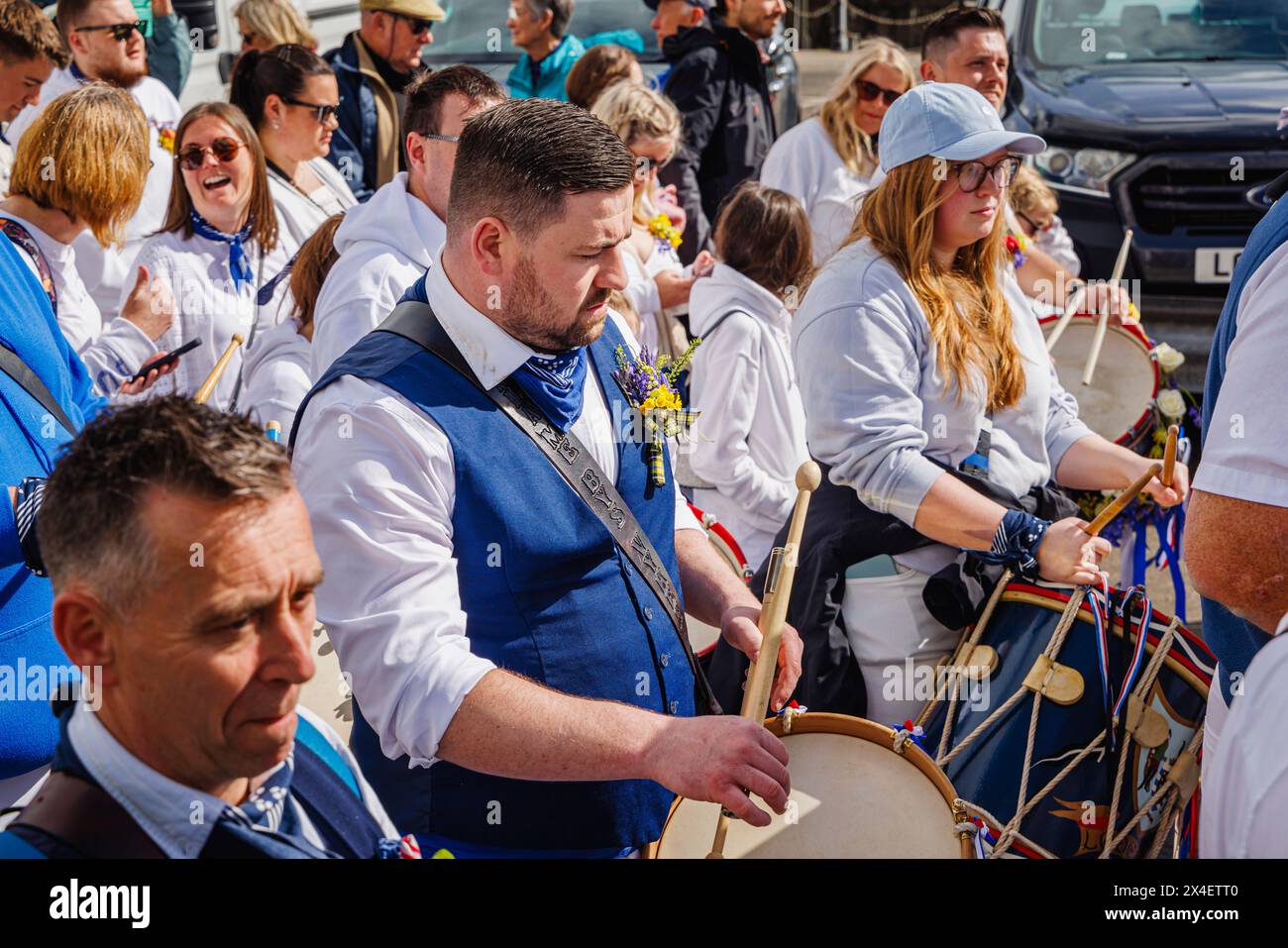 Blue Ribbon drummers parading in the streets at the 'Obby 'Oss festival, a traditional annual May Day folk event in Padstow, Cornwall Stock Photo