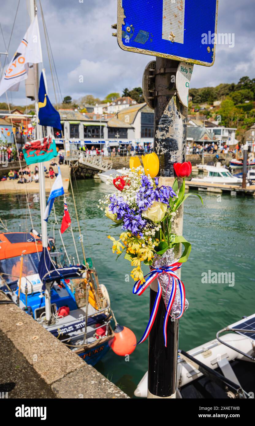 Garland of bluebells and cowslips by the harbour for the 'Obby 'Oss