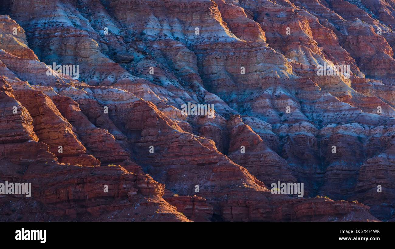 USA, Utah. Sunrise on eroded mountain badlands formations. Stock Photo