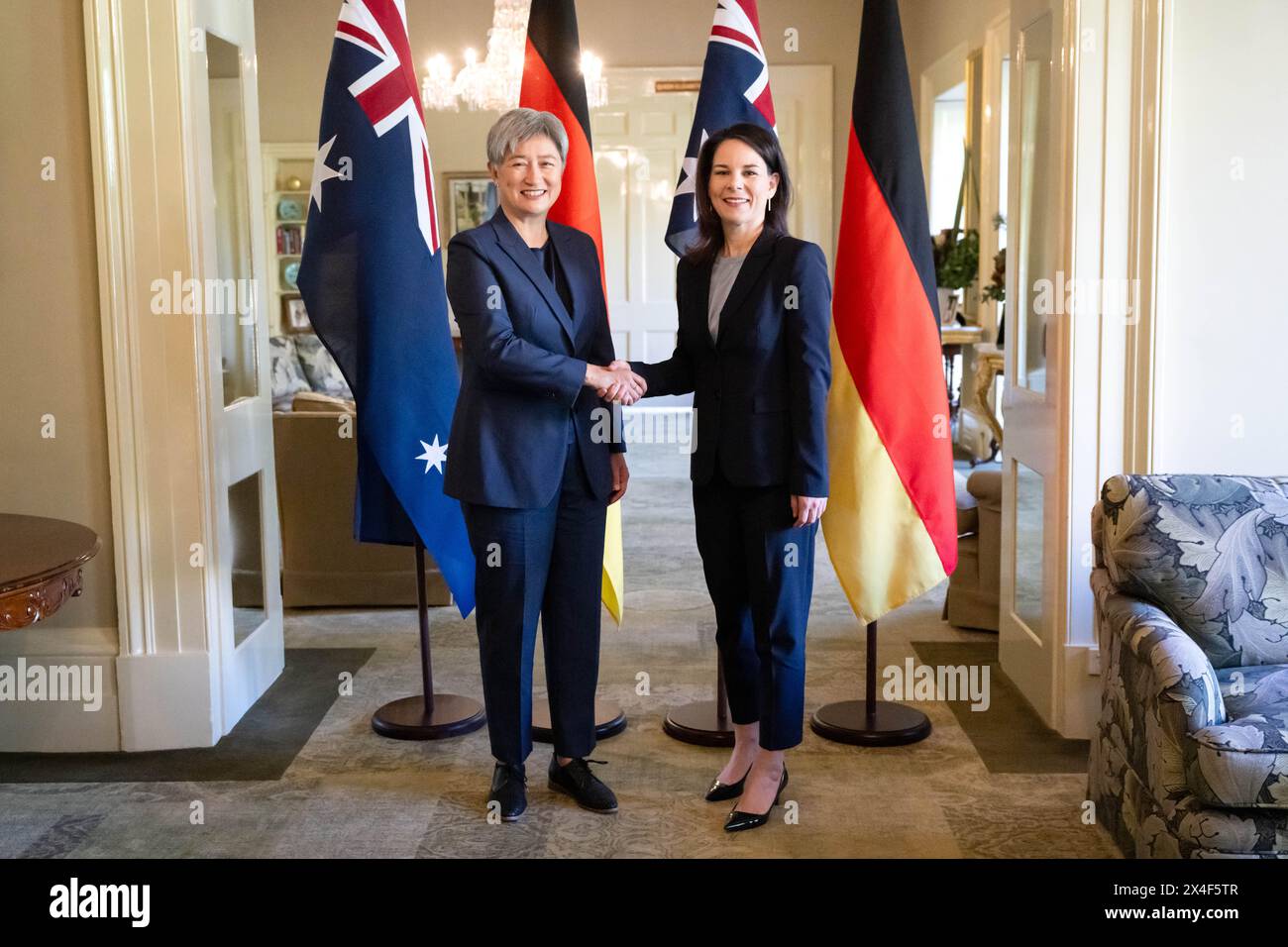 Adelaide, Australia. 03rd May, 2024. Annalena Baerbock (Alliance 90/The Greens, r), Foreign Minister, is received by Penny Wong, Foreign Minister of Australia, at the official residence of the Governor of the state of South Australia. Foreign Minister Baerbock's week-long trip to Australia, New Zealand and Fiji will focus on security policy and climate protection. Credit: Sina Schuldt/dpa/Alamy Live News Stock Photo