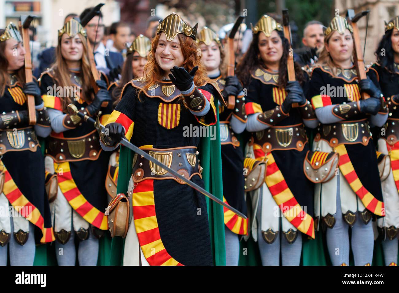 Alcoy, Spain, 04-20-2024: Moors and Christians, parade Diana Fila Aragoneses with their squad corporal Stock Photo