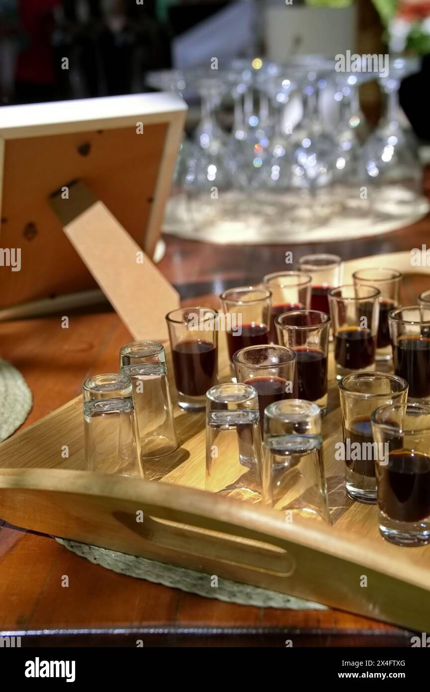 Alcohol drink in glasses on rustic table Stock Photo