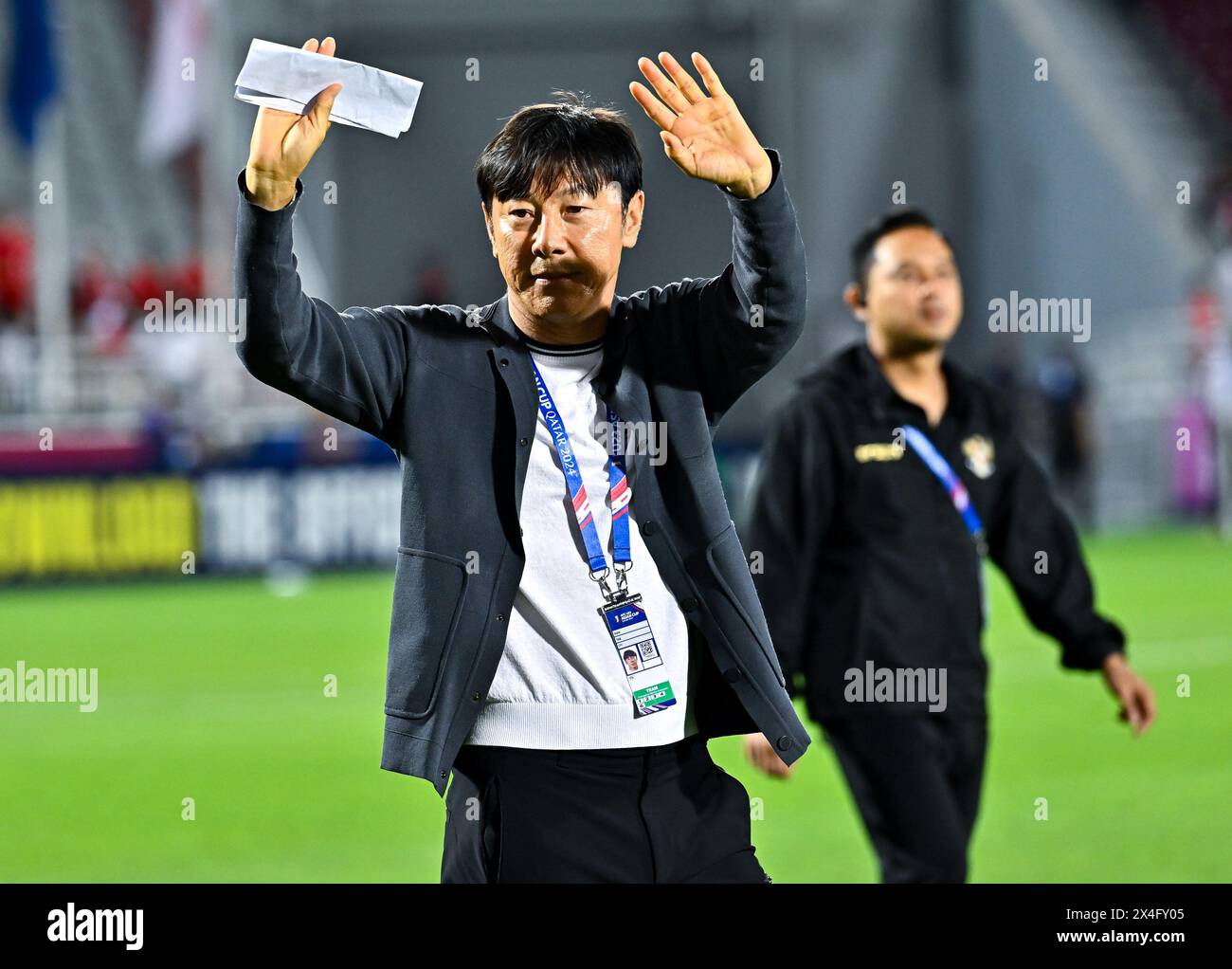 Doha, Qatar. 2nd May, 2024. Shin Tae Yong, head coach of Indonesia, applauds the fans after their loss in the third-place match between Iraq and Indonesia at AFC U23 Asian Cup Qatar 2024 football tournament in Doha, Qatar, May 2, 2024. Credit: Nikku/Xinhua/Alamy Live News Stock Photo
