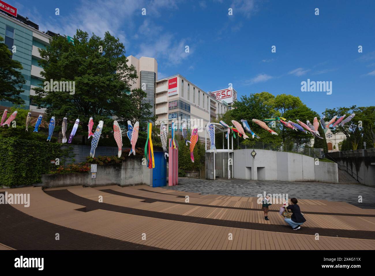 Yokohama, Japan. 02nd May, 2024. Mother takes photos of her daughter
