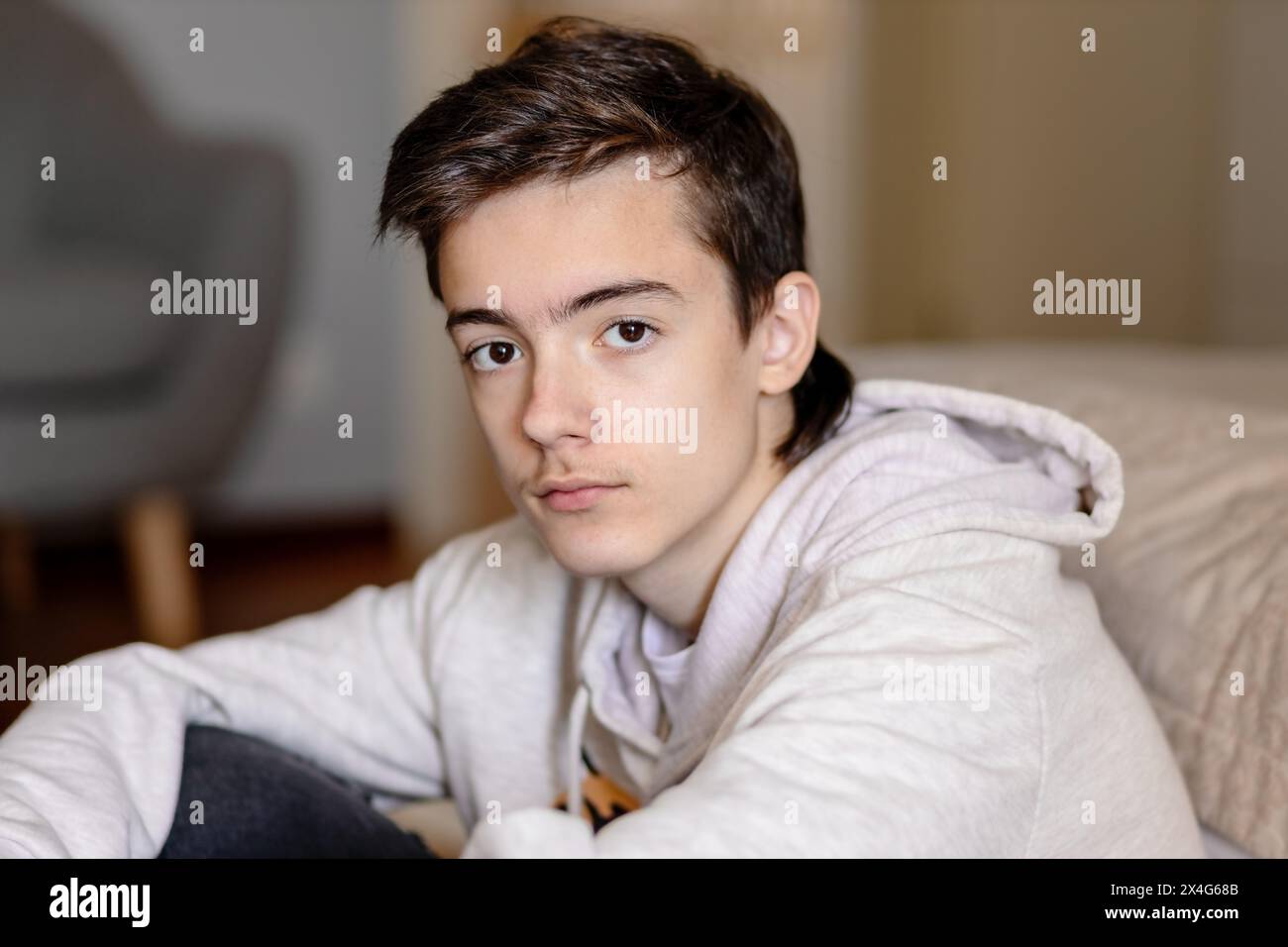 Portrait of pensive teenage boy Stock Photo