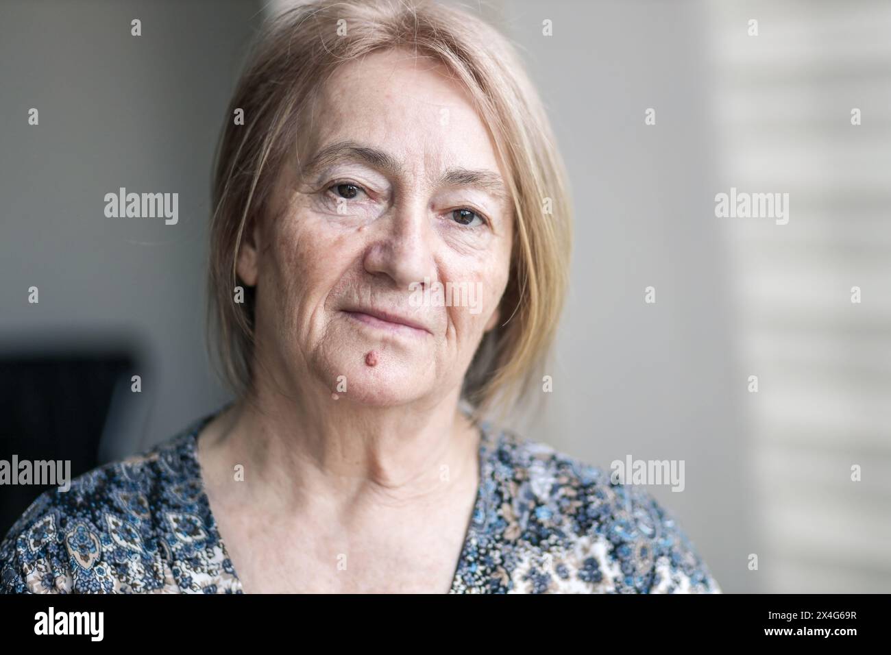 Portrait of pensive senior woman Stock Photo