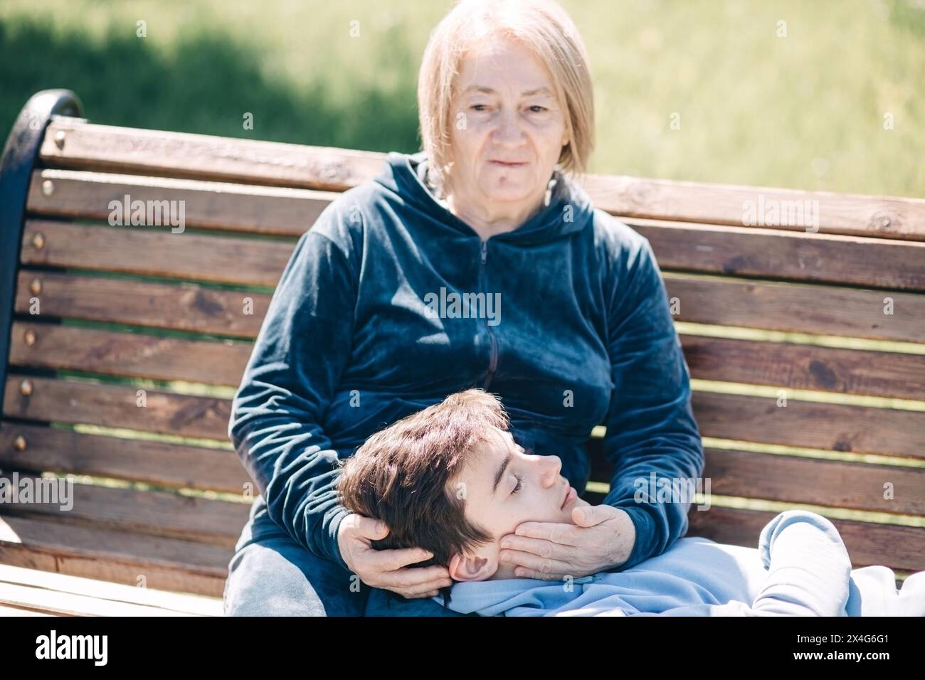 Mature woman holding her grandson Stock Photo