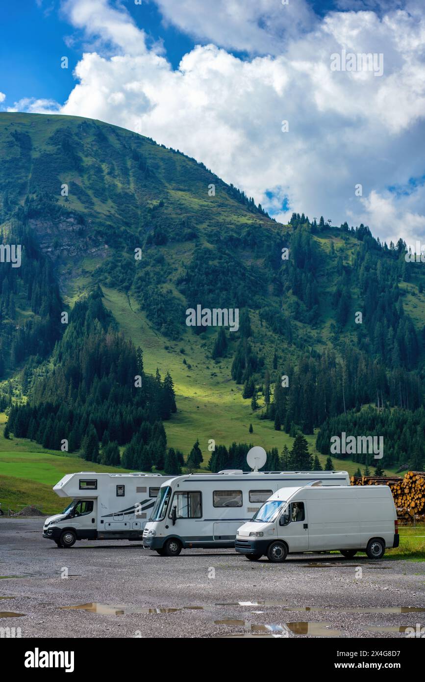Camper van and motorhomes parked on a mountain landscape Stock Photo ...