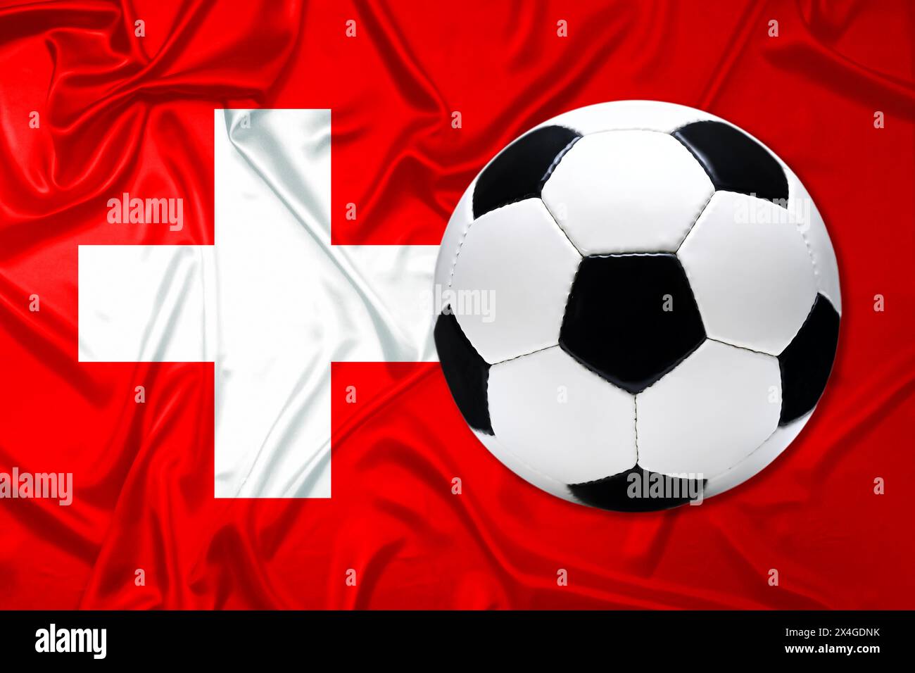 Black and white leather football with flag of Switzerland Stock Photo