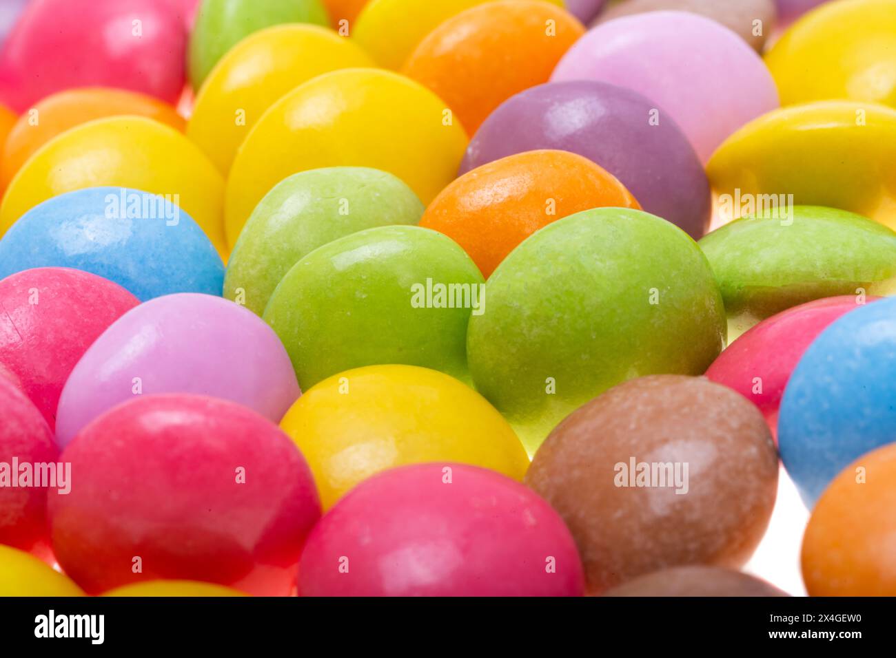 chocolate colored buttons isolated on white background Stock Photo