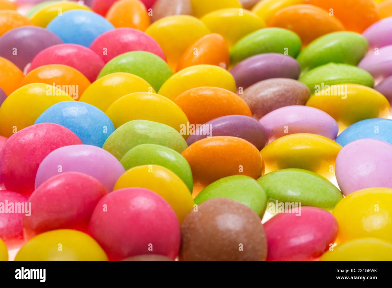 chocolate colored buttons isolated on white background Stock Photo