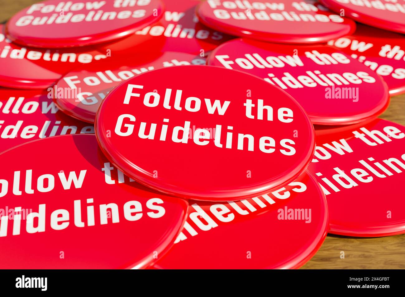 Follow the guidelines. Follow the guidelines. Red badges laying on the table with the message follow the guidelines . Rules, manual, advice, instructi Stock Photo